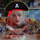 Margot Robbie as Harley Quinn (with a pirate hat).